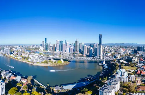 High altitude view of Brisbane skyline and Story Bridge from the suburb of New Farm and Wilson Outlook Reserve on a sunny winter’s morning in Queensland, Australia.